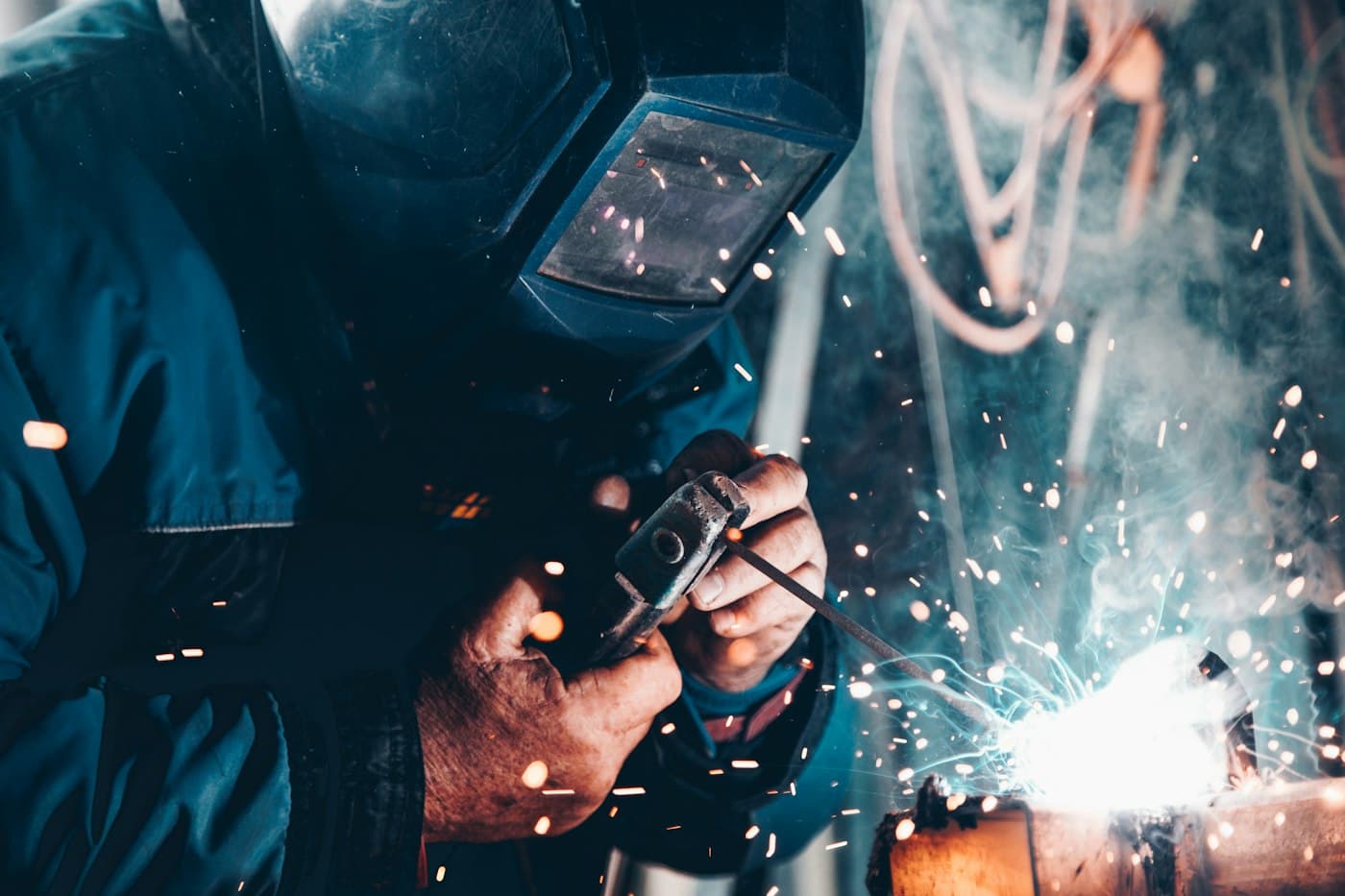 A welder in a shower of sparks